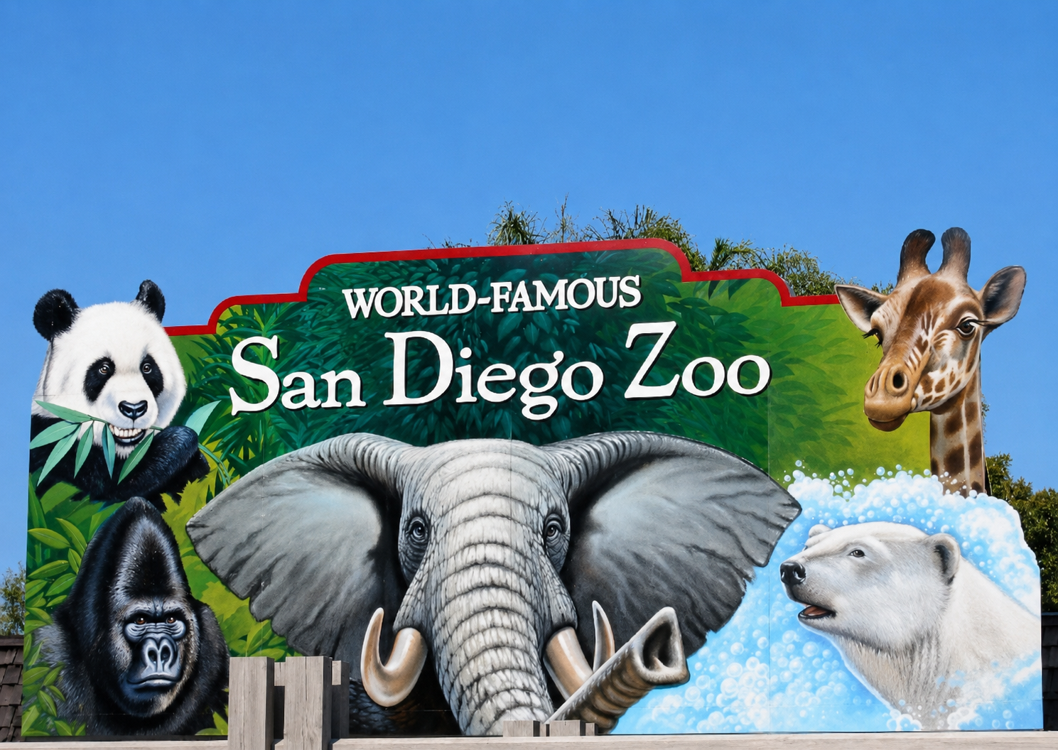 Colorful world-famous San Diego Zoo entrance mural featuring a panda, gorilla, elephant, giraffe and polar bear